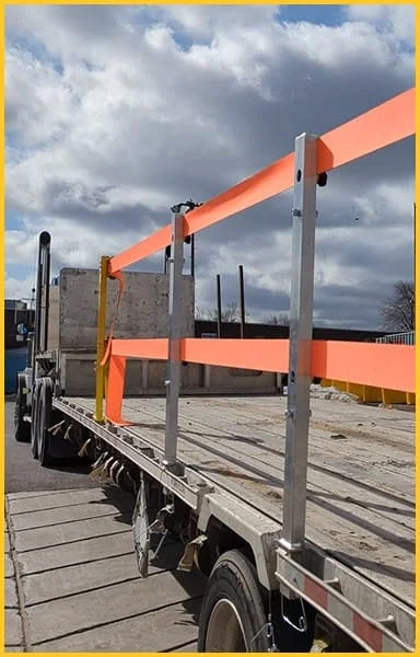 Side view of TrukRail installed on a flatbed.